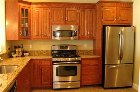 stainless steel appliances with honey oak cabinets|honey oak cabinet finish.